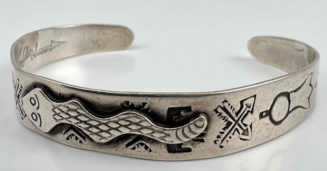 Vintage Sterling Silver Native American Style Cuff Bracelet: Vintage Sterling Silver Native American Style Cuff Bracelet, 10.8g. Marked Sterling, Silver Arrow. Inner cuff 5.375in, cuff break 1.125in, width 0.375in. All measurements are approximate.