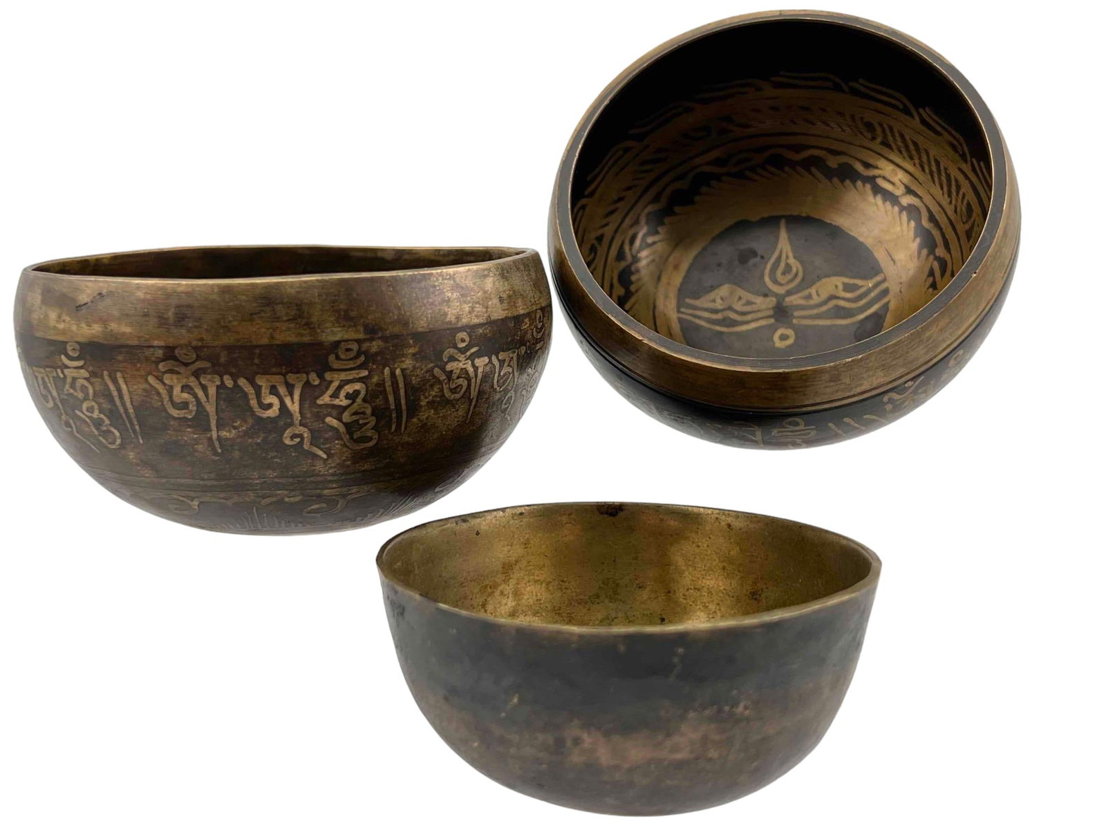 Three Graduated Tibetan Singing Bowls: 3 Graduated Tibetan singing Bowls. Largest 4.25W x 4.25L x 2.25D in. Smallest 3.5W x 3.5L x 1.5DD in. All Measurements are Approximate.