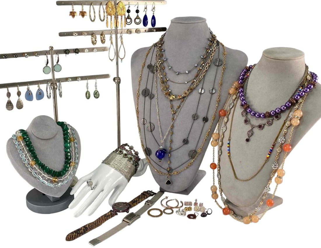 Costume Jewelry Lot: Costume Jewelry Lot. Includes Necklaces, rings, bracelets, watches, earrings, malachite, glass beads, and more. Largest necklace 33.5L x 0.5W in. Smallest earrings 0.125L x 0.125W in. All measurements