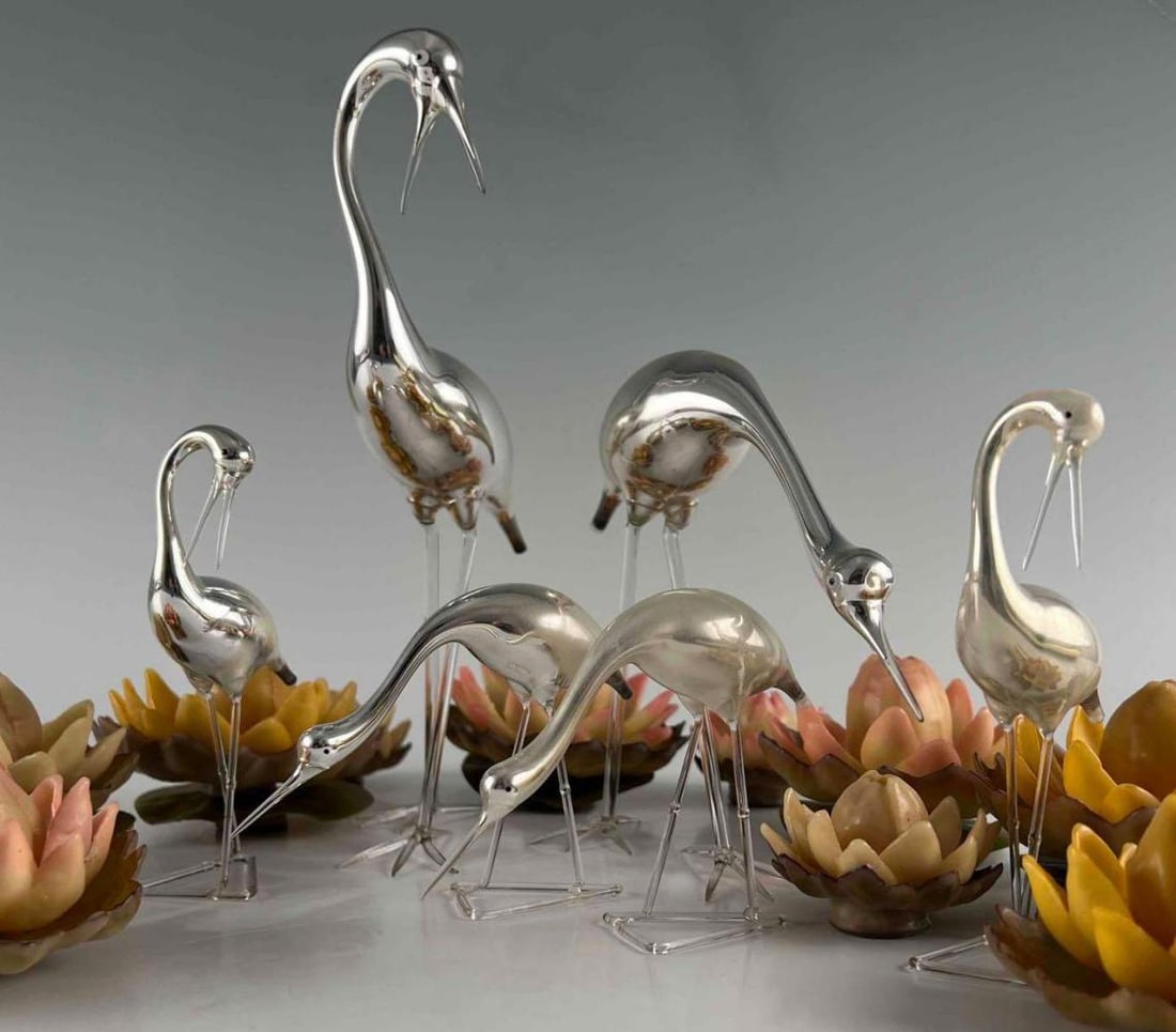 Set of Bimini Art Deco Mercury Glass Art Glass Crane Figures: Hand Blown Art Glass Cranes & Wax Waterlilies. Largest crane 10.25H x 5.25W x 3.375D in. Smallest crane 3.625H x 5.125W x 1.375D in. Largest flower 3.625W x 2.0625H in. Smallest flower 1.75H x 2.625W 