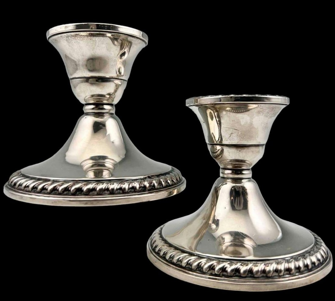 Pair Of Sterling Silver Candlesticks: Pair Of Sterling Silver Candlesticks. Marked "Cornwell Sterling, Weighted, Reinforced, 3." Each Approximately 3.625W x 3.125H in.