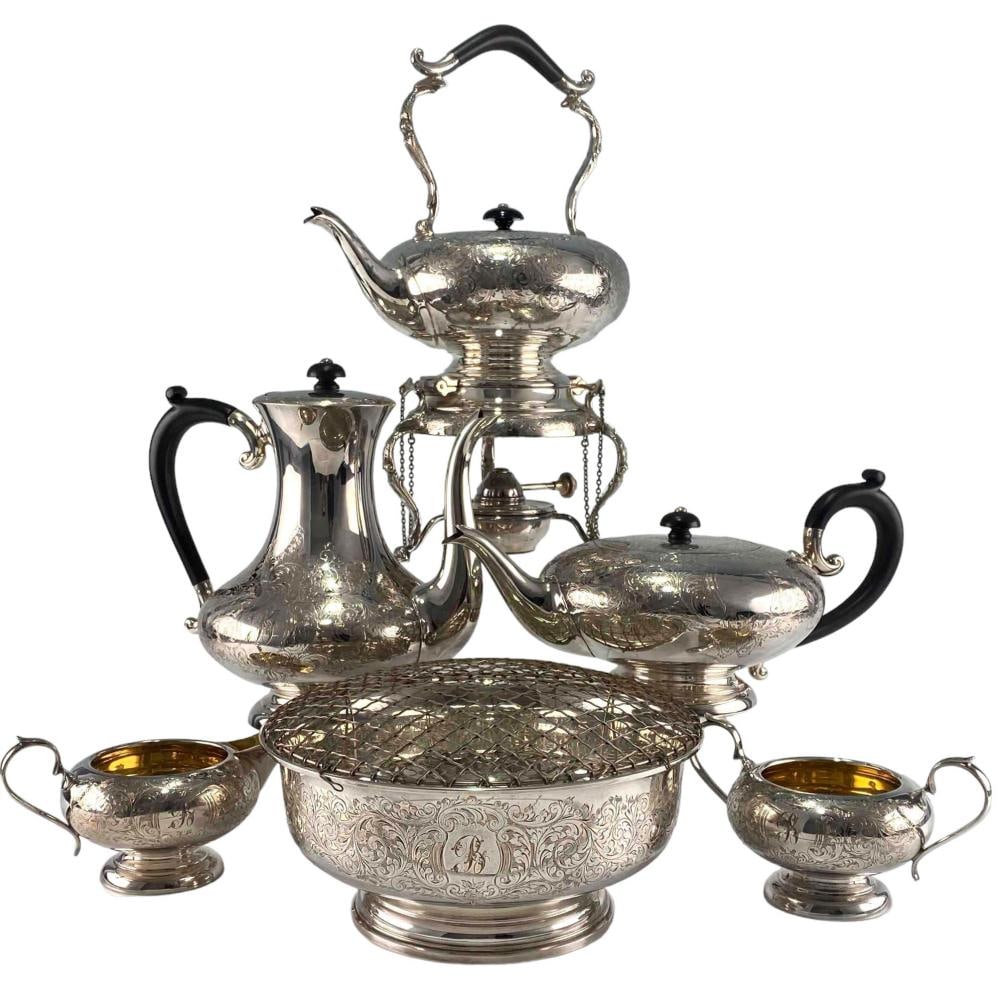 Charles S. Green & Co. English Sterling Silver Tea Service: Charles S. Green & Co. English Sterling Silver Tea Service, 3562.7g. Marked "CSG&Co", "Johnson-Hutchinson Ltd." Largest piece 14.1875H x 9.375W x 6.875D in. Smallest piece 3.375H x 6.625W x 4.25D. ALL