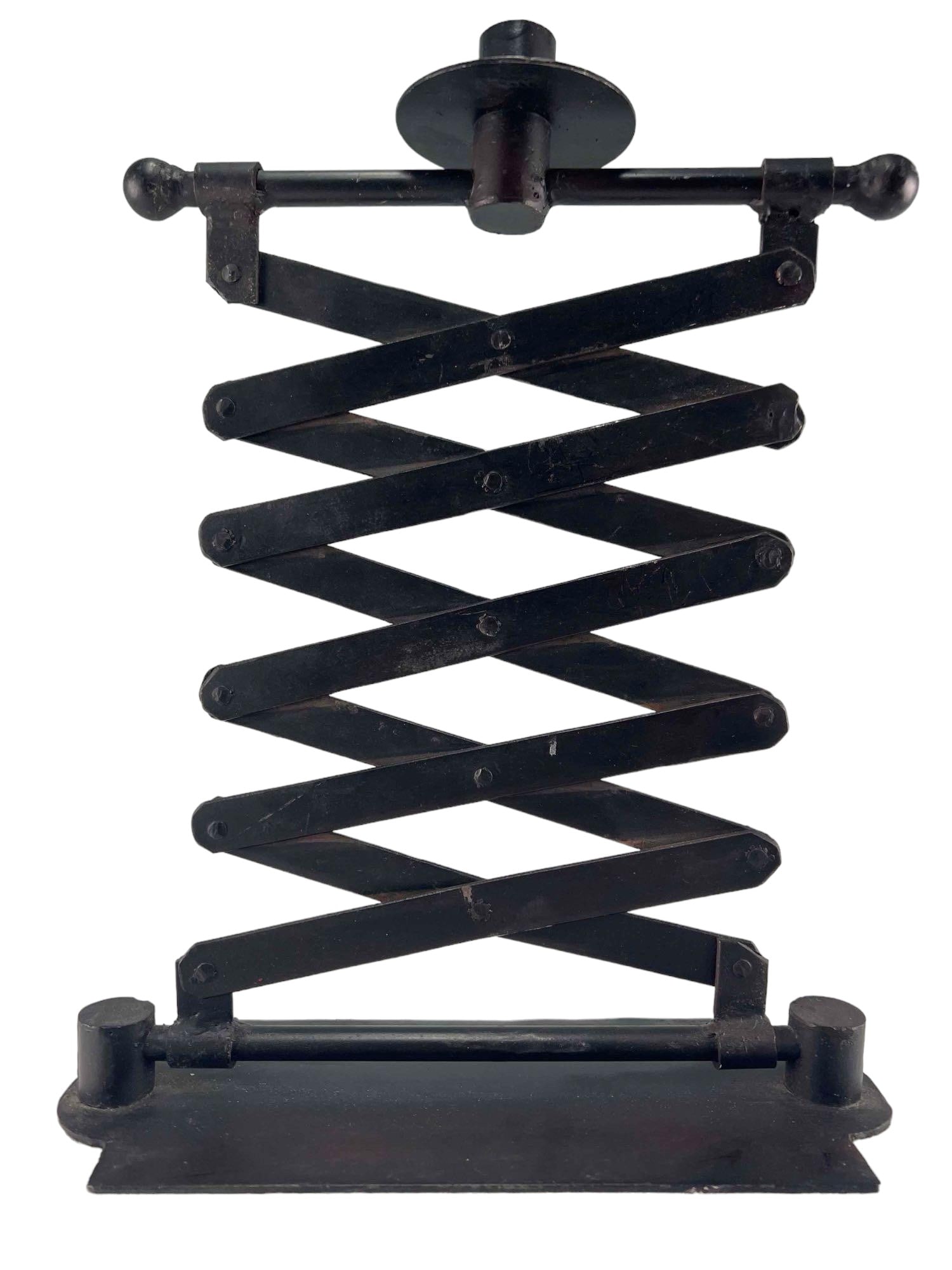 Industrial Scissor Extending Iron Candle Holder: Industrial Movable Iron Candle Holder. Approximately 14.0H x 11.0W x 4.125D in.
