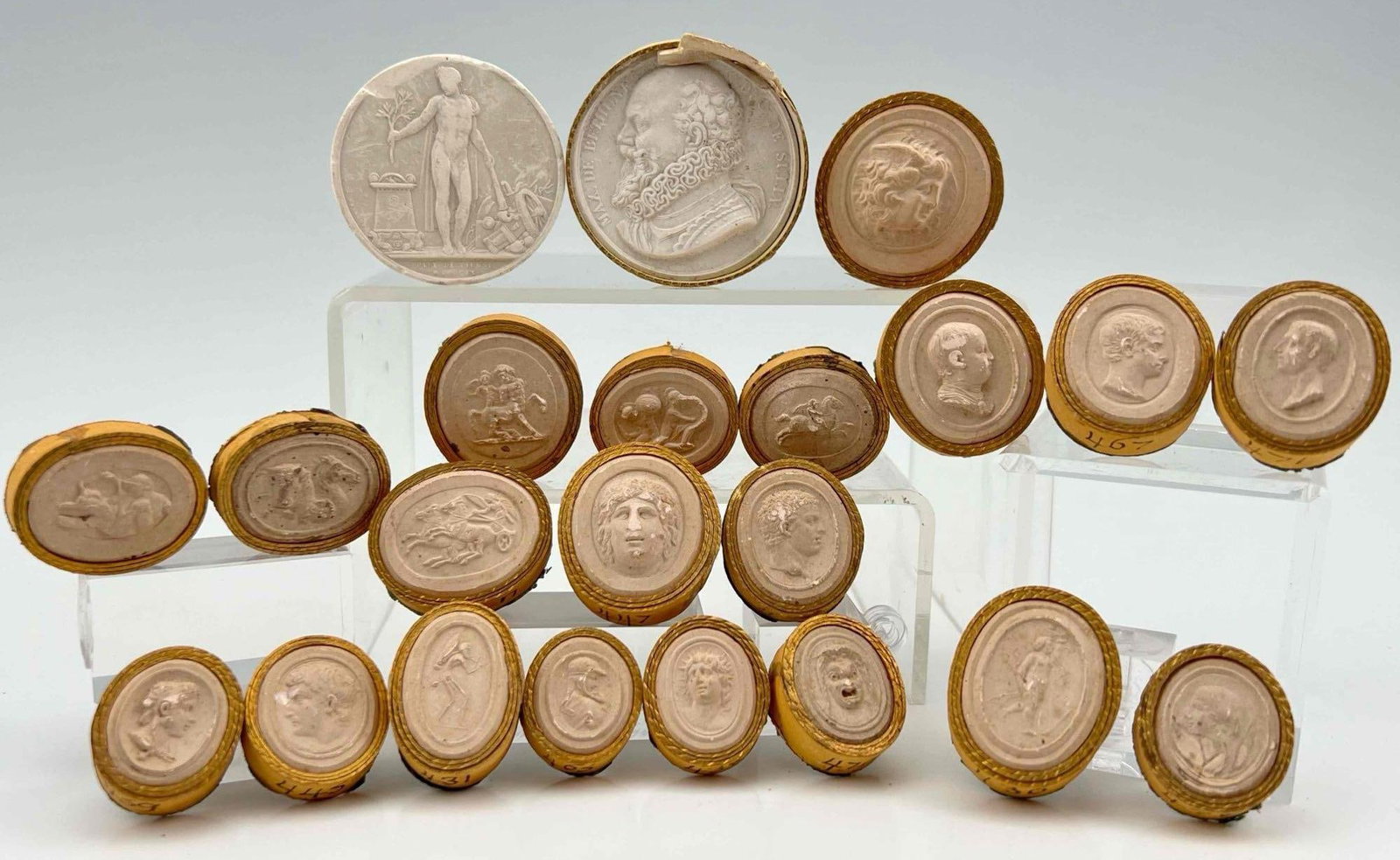 Collection Of Antique Grand Tour Plaster Cameos: Collection Of Antique Plaster Cameos. Largest 1.75W x 1.75L x 0.3125D in. Smallest 0.9375L x 0.75W x 0,1325Din. All Measurements are Approximate.