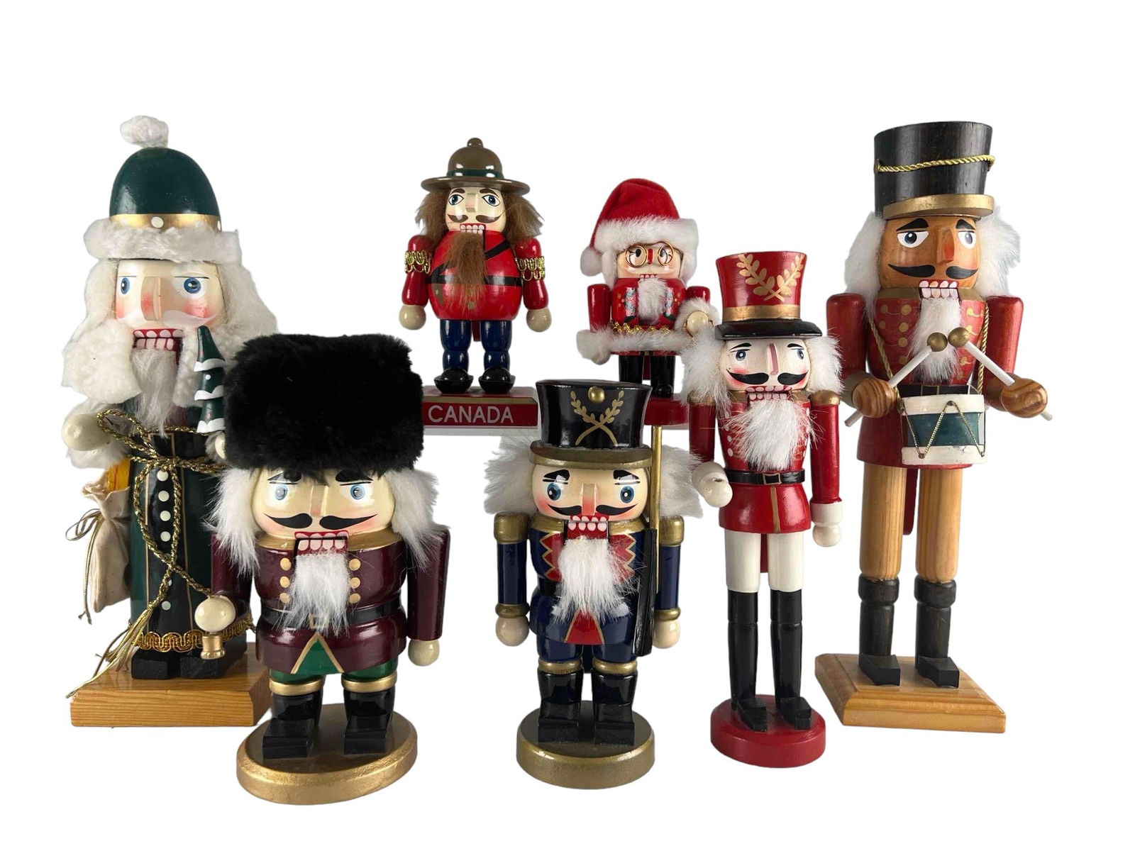 Group Of Christmas Nutcrackers: Group Of Christmas Nutcrackers. Smallest 5.0H x 3.75W x 2.25D, Largest 12.0H x 3.25W x 3.0D All Measurements Approximate
