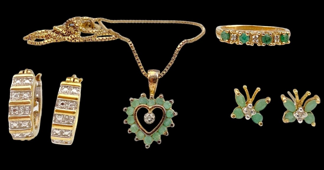 Vermeil 925 Jewelry. Includes Emerald ring: Vermeil 925 Jewelry. Includes Emerald ring, earrings, and necklace. Markings include 925 China. Ring size 7, necklace 19 in.