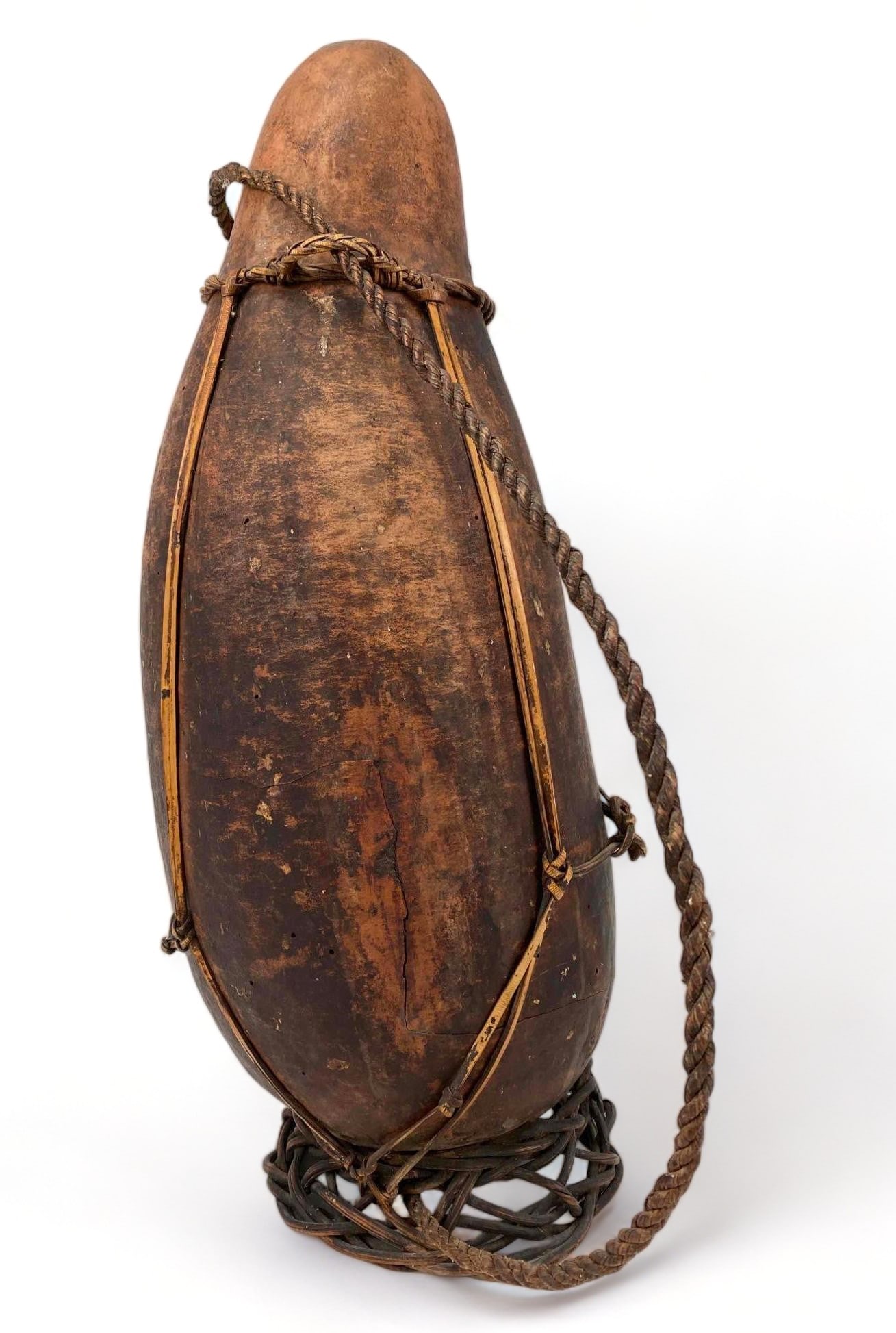 African Gourd Milk or Water Vessel: African Gourd Milk or Water Jug Vessel. Approximately 18.5 x 7.8125 x 7.5 in.