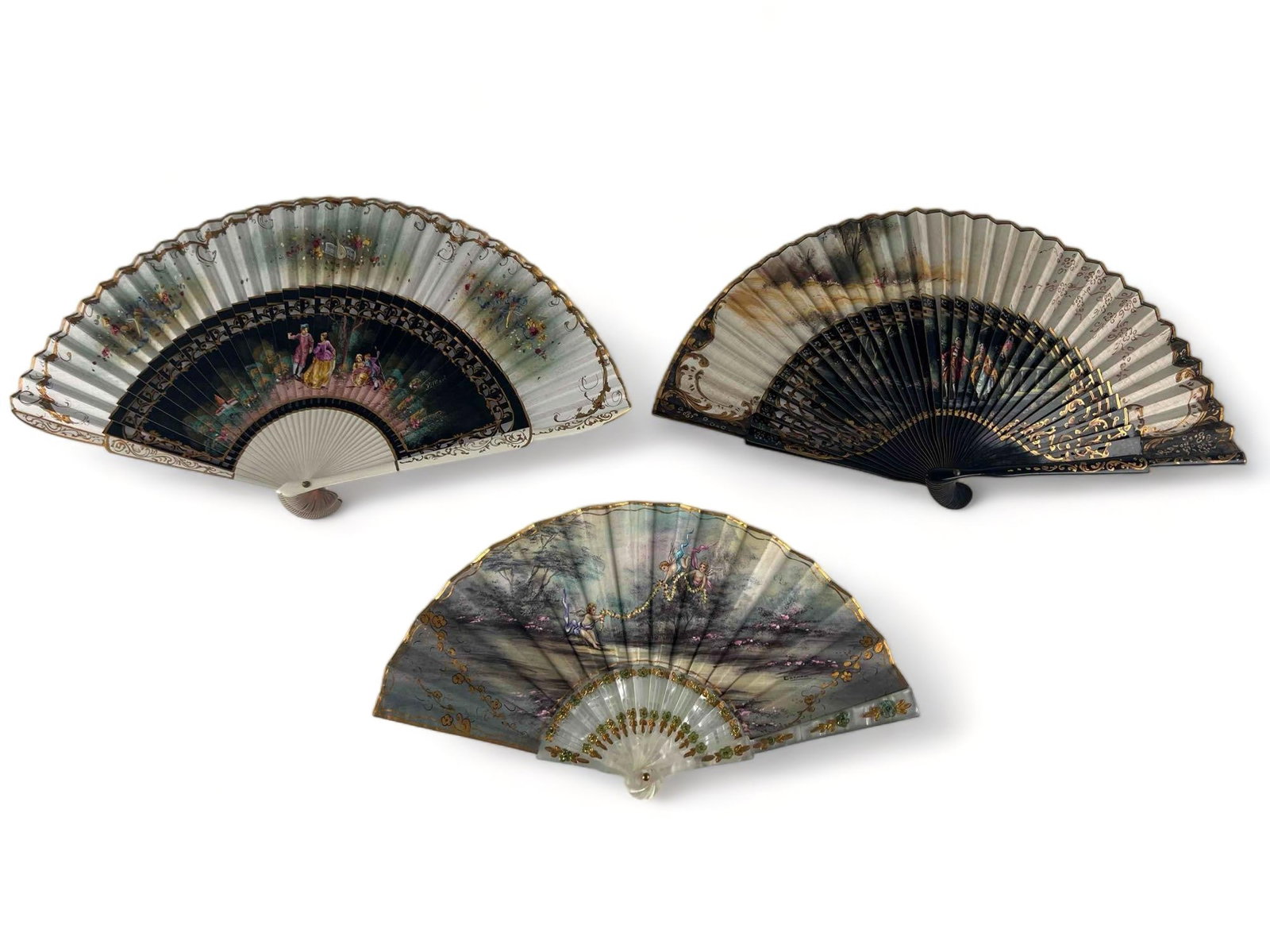 Three Older Hand Painted Spanish Fans: Three Older Hand Painted Spanish Fans. Largest (Open) approximately 16.625W x 9.25H in. Smallest approximately 13.5W x 7.375H in.