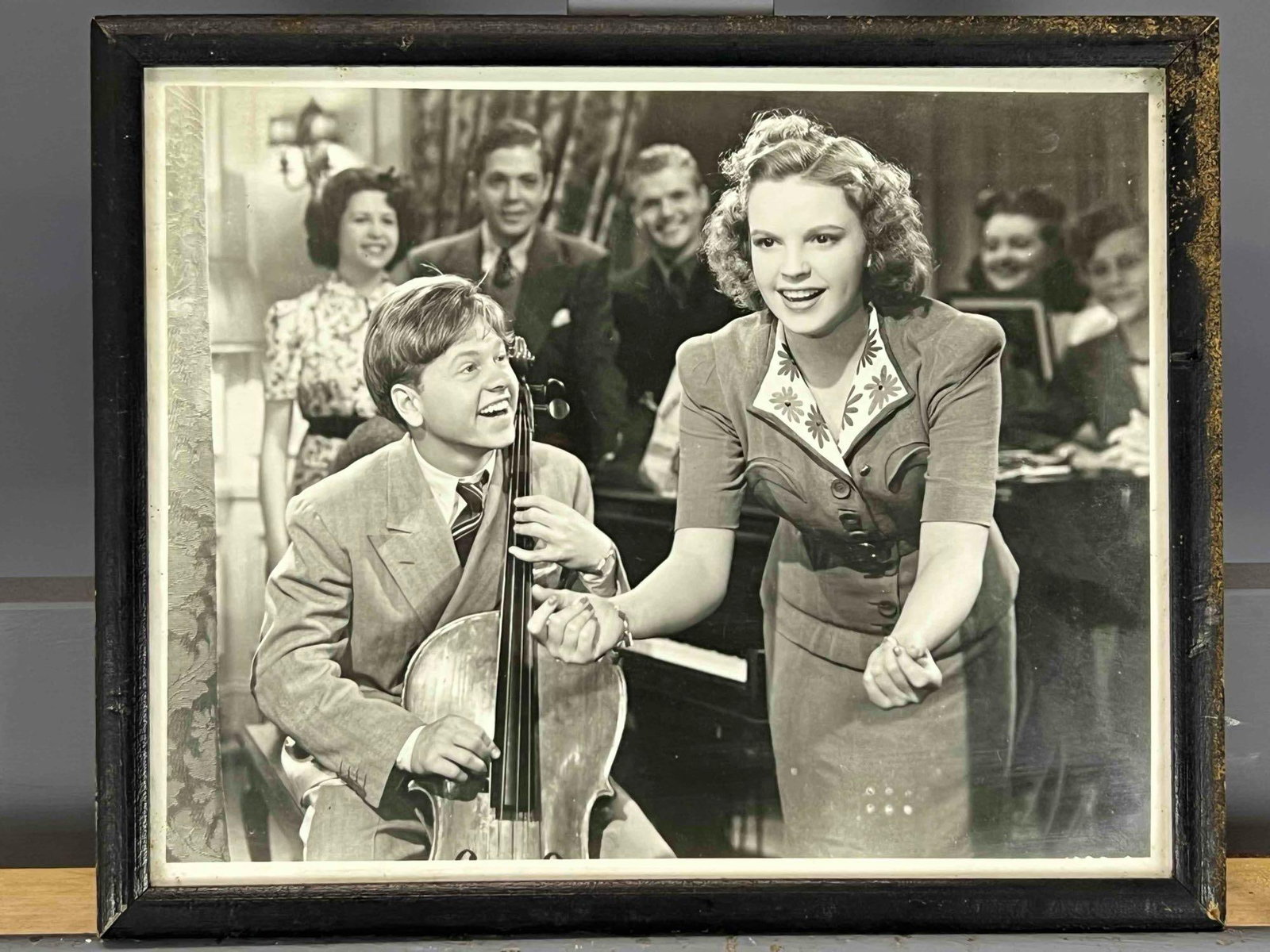 Judy Garland & Mickey Rooney Photograph: Judy Garland & Mickey Rooney Photograph. As framed 10.75W x 8.75H x 0.5D in. Sight 9.625W x 7.75H in. All Measurements are Approximate.