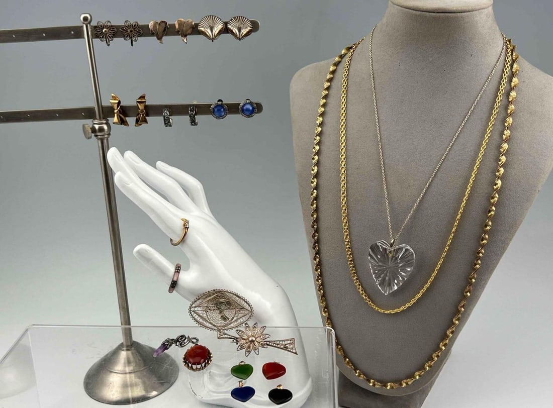 Sterling Silver & Vermeil Jewelry Lot: Sterling Silver & Vermeil Jewelry Lot. 111.1g. Marked or test as sterling. Includes Rings, Chains and Earrings, Smallest (Earrings) 0.375H x 0.25W x 0.25D, Largest (Chain) 14.25L x 0.125W in. All Meas
