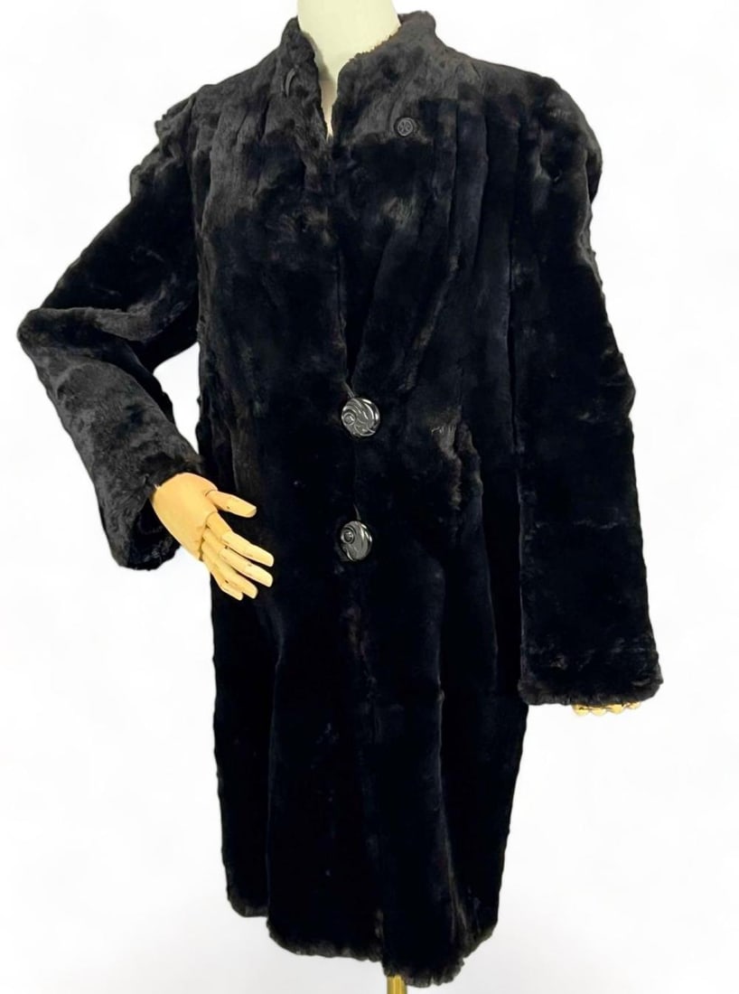 Art Deco Black Sheared Fur Coat: Art Deco Black Sheared Fur Coat. Tag marked "Weisingers House of Furs Stockton, Cal. Guaranteed." Chest:36.0 in.Waist: 46.0 in. Sleeves: 22.0 in.All Measurements are approximate and Taken Flat.