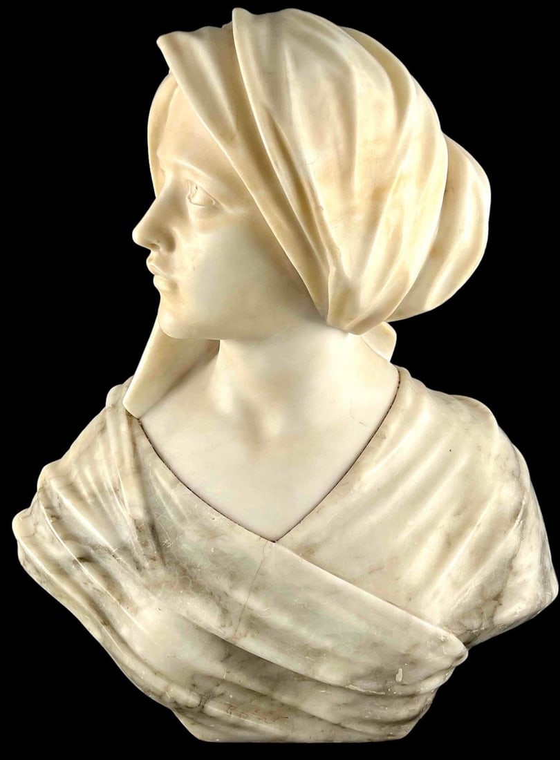 Italian Marble and Alabaster Bust of a Woman: Italian Marble and Alabaster Bust of a Woman. Approximately 14.0W x 8.0D x 17.75H in.