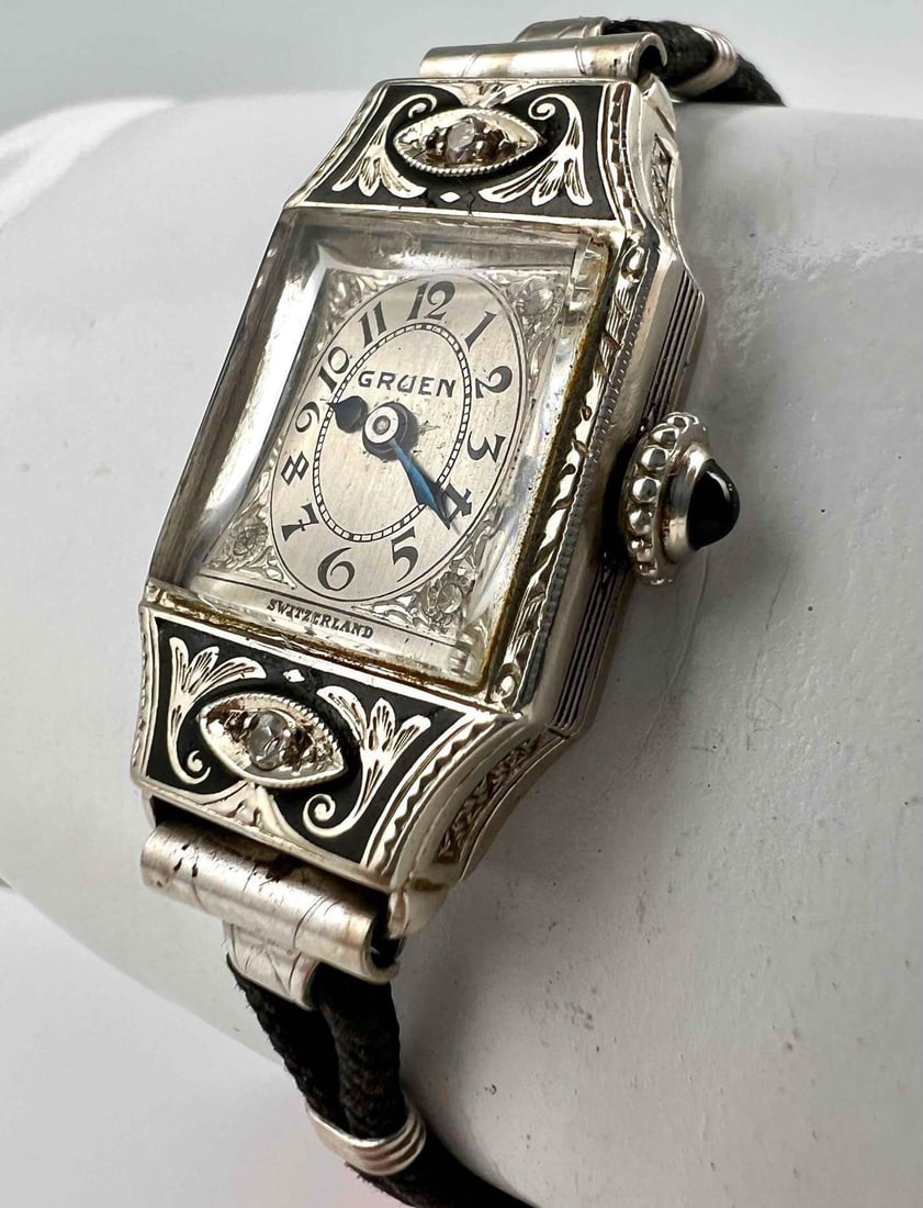 Gruen Art Deco 14K Diamond, Enamel Ladies Watch: Gruen Art Deco 14K Diamond, Enamel Ladies Watch. Face marked "Gruen Switzerland." Inner case marked "Gruen 14K Cincinnati 833/62 1123726" Back of Movement Marked "Fifteen 15 Jewels Four 4 ADJ 1494768,