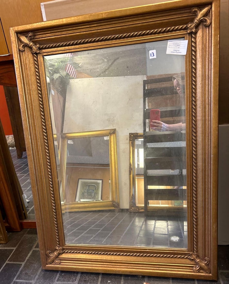 Gilt Hardwood Mirror With Fleur De Lis Details: Gilt Hardwood Mirror With Fleur De Lis Details. Approximately 45.0H x 35.0W x 2.0D in.