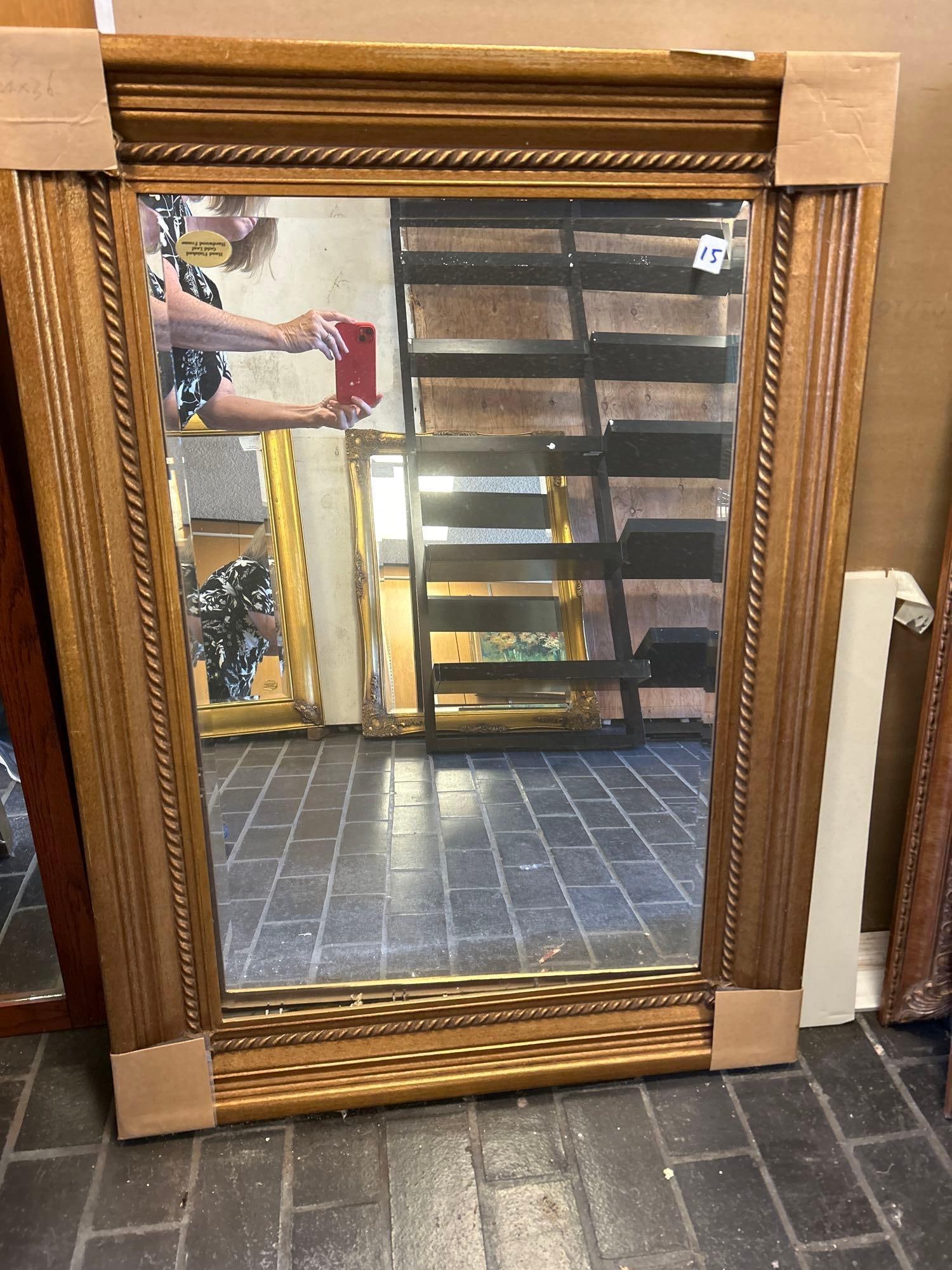 Gilt Hardwood Mirror With Fleur De Lis Details: Gilt Hardwood Mirror With Fleur De Lis Details. Approximately 45.0H x 35.0W x 2.0D in. Please note that mirror is loose and needs to be secured in frame.