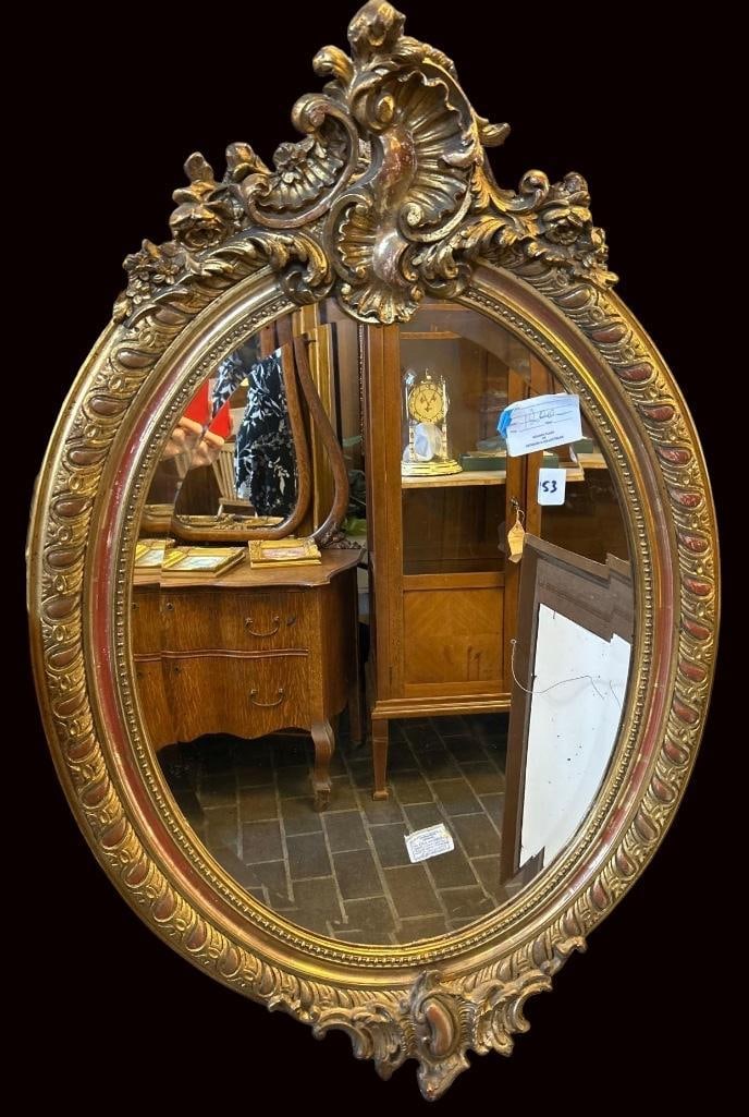 Antique Gilt Oval Mirror: Antique Gilt Oval Mirror. Approximately 41.5H x 27.5W x 5.625D in.