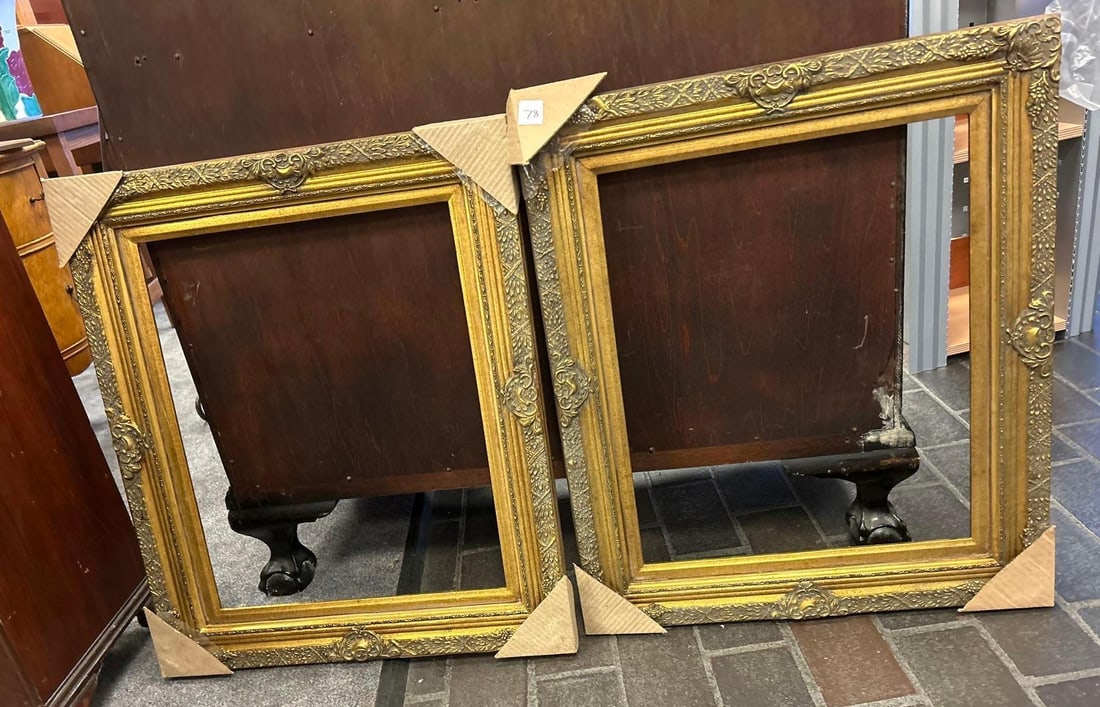 Pair Of Antique Style Gilt Frames: Pair Of Antique Style Gilt Frames. Each approximately 26.0H x 21.75W x 1.0D in.