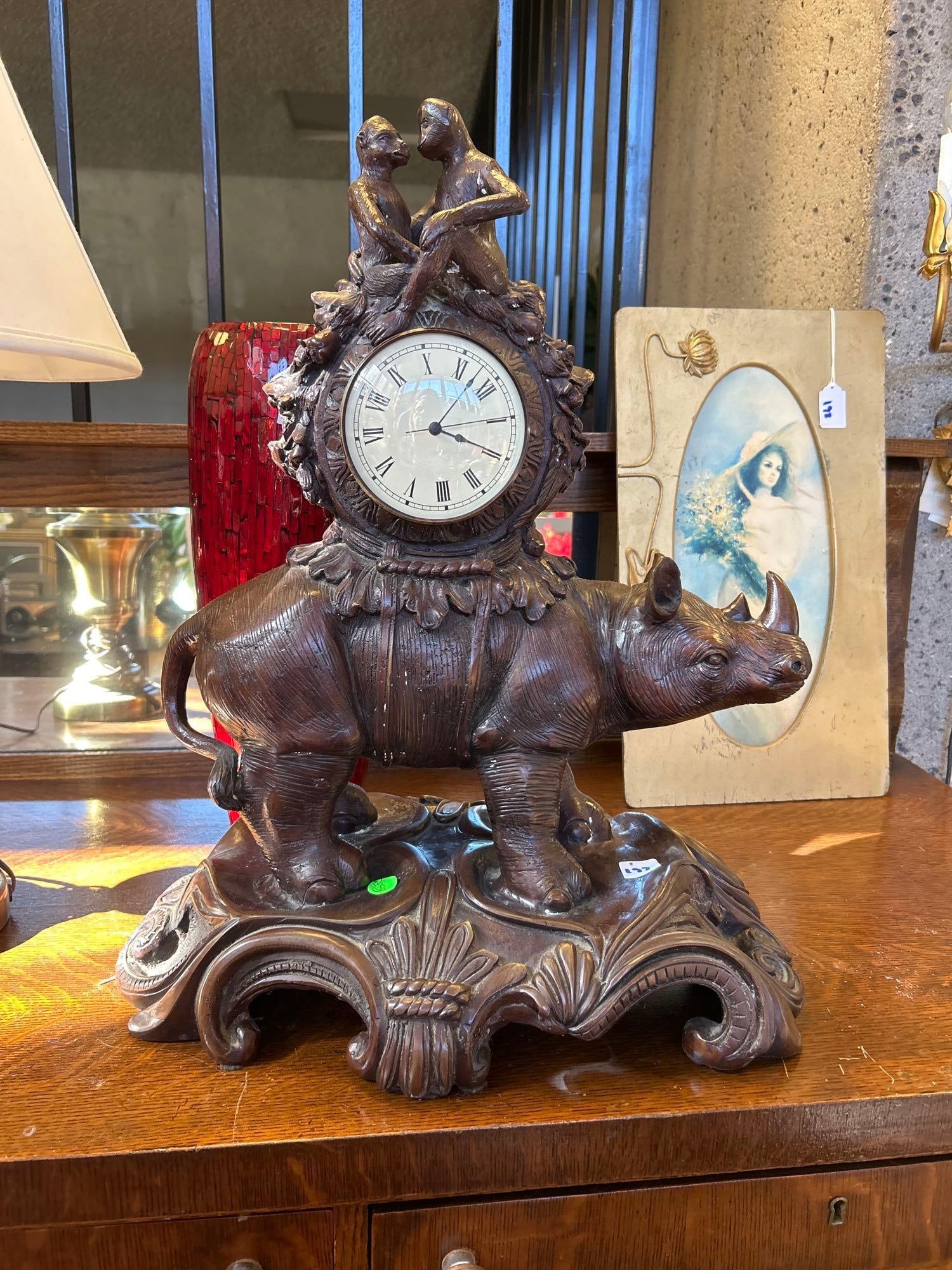 Bronze Mantel Clock With Monkey & Rhinocerous Design: Bronze Mantel Clock With Monkey & Rhinocerous Design. Approximately 22.0H x 17.0W x 11.0D in.