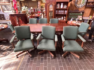 Eight Brass Tack Swivel Conference Chairs