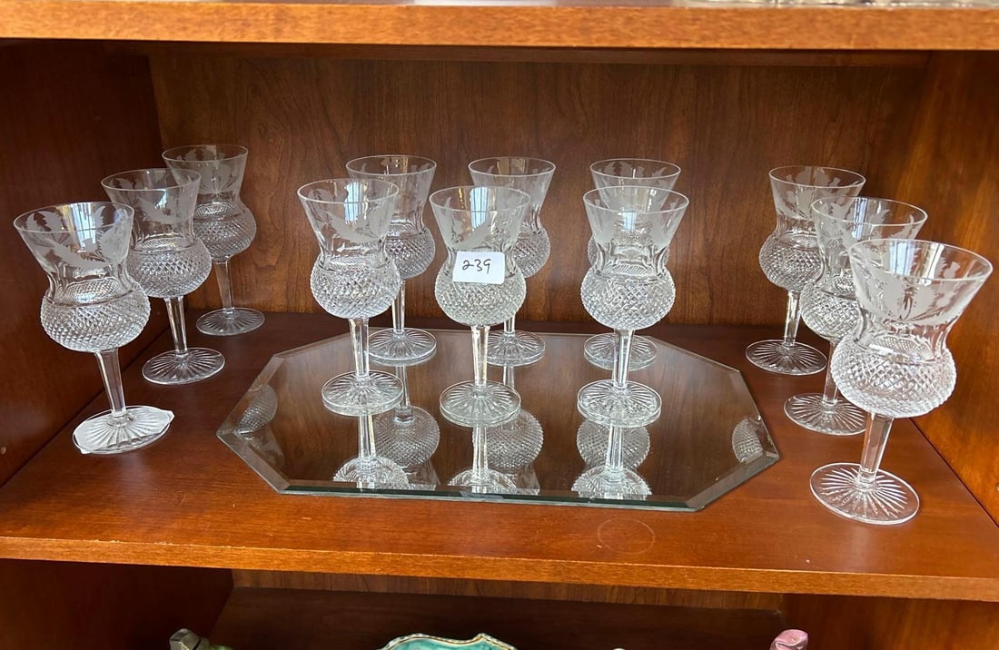 12 Edinburgh Crystal Tall Water Goblets And Wine Stems, Etched Thistle Pattern: 12 Edinburgh Crystal Tall Water Goblets And Wine Stems, Etched Thistle Pattern. Marked "Edinburgh Scotland." Water goblets approximately 7.25 x 3.0 in.
