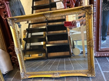 Contemporary Gilt Beveled Mirror.