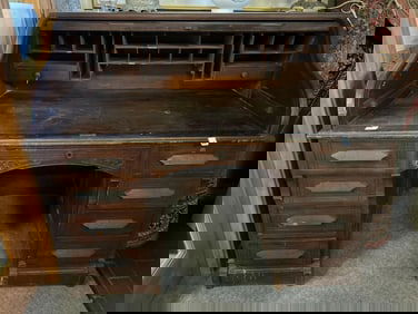 Older Roll Top Desk With Carved Details