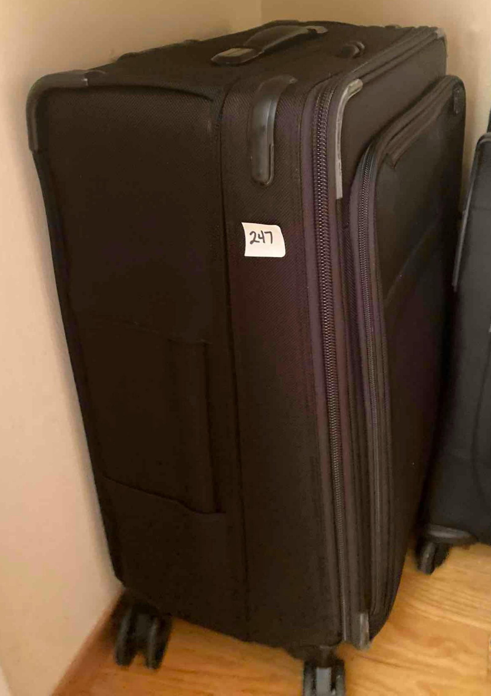 Briggs & Riley Black Four Wheel Suitcase: Briggs & Riley Black Four Wheel Suitcase Pick-Up will be Thursday Aug 8th & Saturday Aug 10th from 11:00-4:00. Shipped items must have shipping arranged by Saturday, Aug 10th. Items not picked up or w