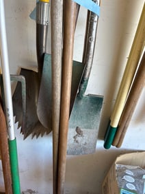 A Lot Of Four Shovels And Other Gardening Items