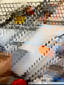 Stihl Trimmer With Face Guard, And Built-In Earmuffs