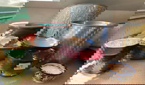 Lot Of Pottery, Buckets, And Colored Stones