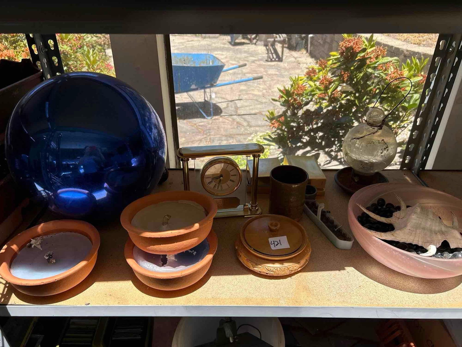 Garden Orb, Flower Frogs, Seashells, Clock, Candles, And More: Garden orb, flower frogs, seashells, clock, candles, and more Pick-Up will be Thursday Aug 8th & Saturday Aug 10th from 11:00-4:00. Shipped items must have shipping arranged by Saturday, Aug 10th. Ite