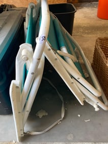 Two Blue Folding Beach Chairs