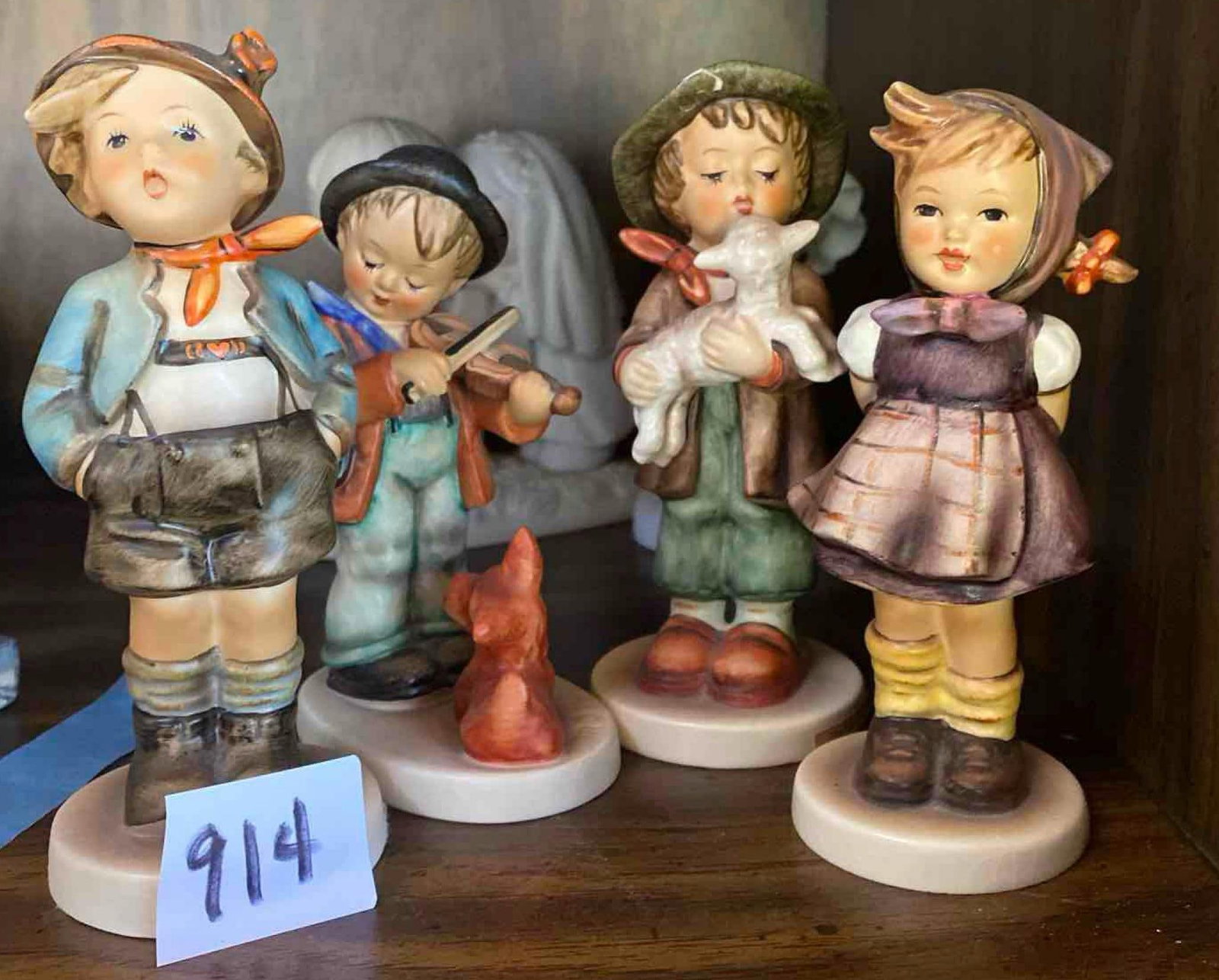Hummel & Other Porcelain Figures: Hummel & Other Porcelain Figures. Each approximately 5-5.75 in High ​​​​​​​SHIPPING AVAILABLE FOR THIS LOT THROUGH LISTED SHIPPERS Pick-Up will be Thursday Au