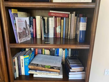 Two Shelves Of Books, Music, Art, & More