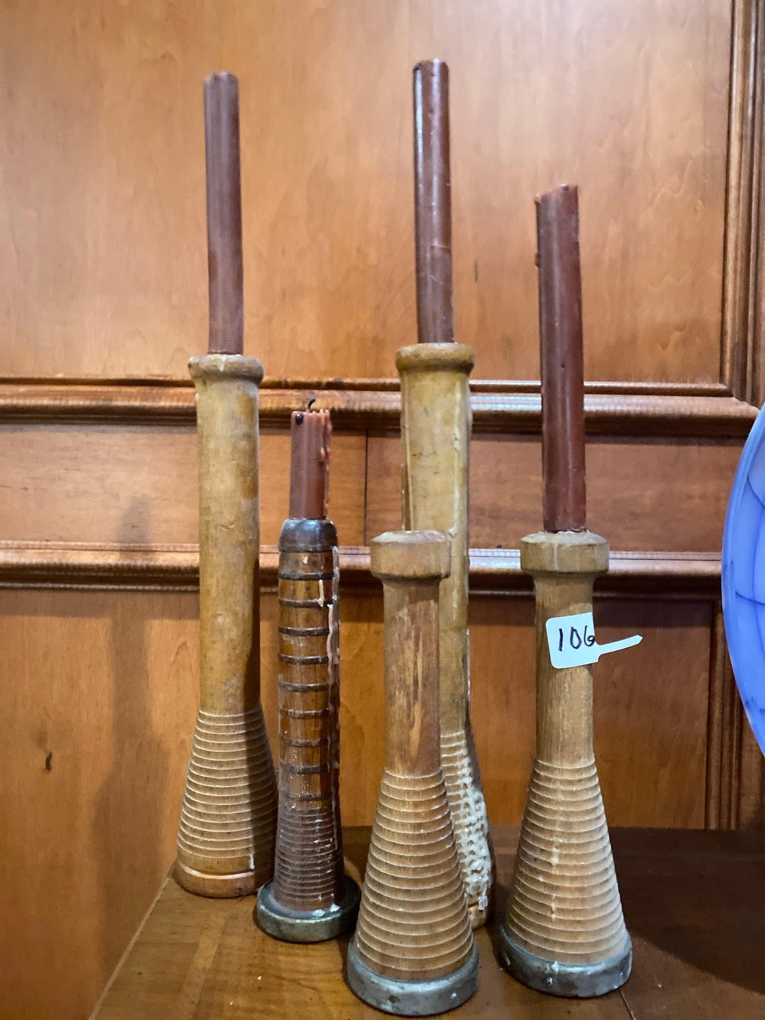 Five Wooden Spool Candlesticks.: Five wooden spool candlesticks.