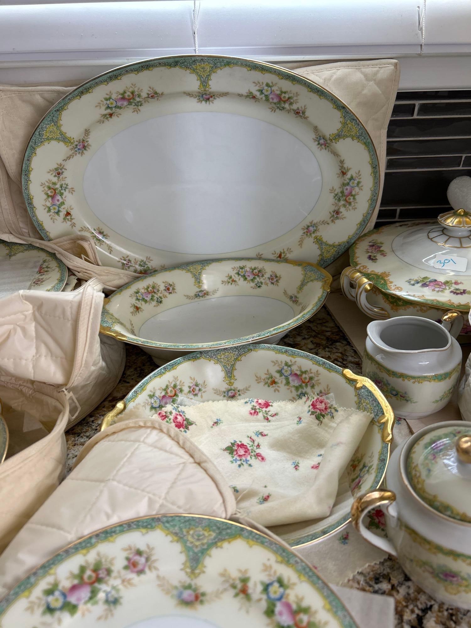 Eight Piece Setting, Mieto China: Eight piece setting, MIETO China. Eight salads eight Dinner plates, creamer, and sugar, serving bowl oval round serving bowl 60 cup saucers, one soup bowl, Large serving platter. In used condition not