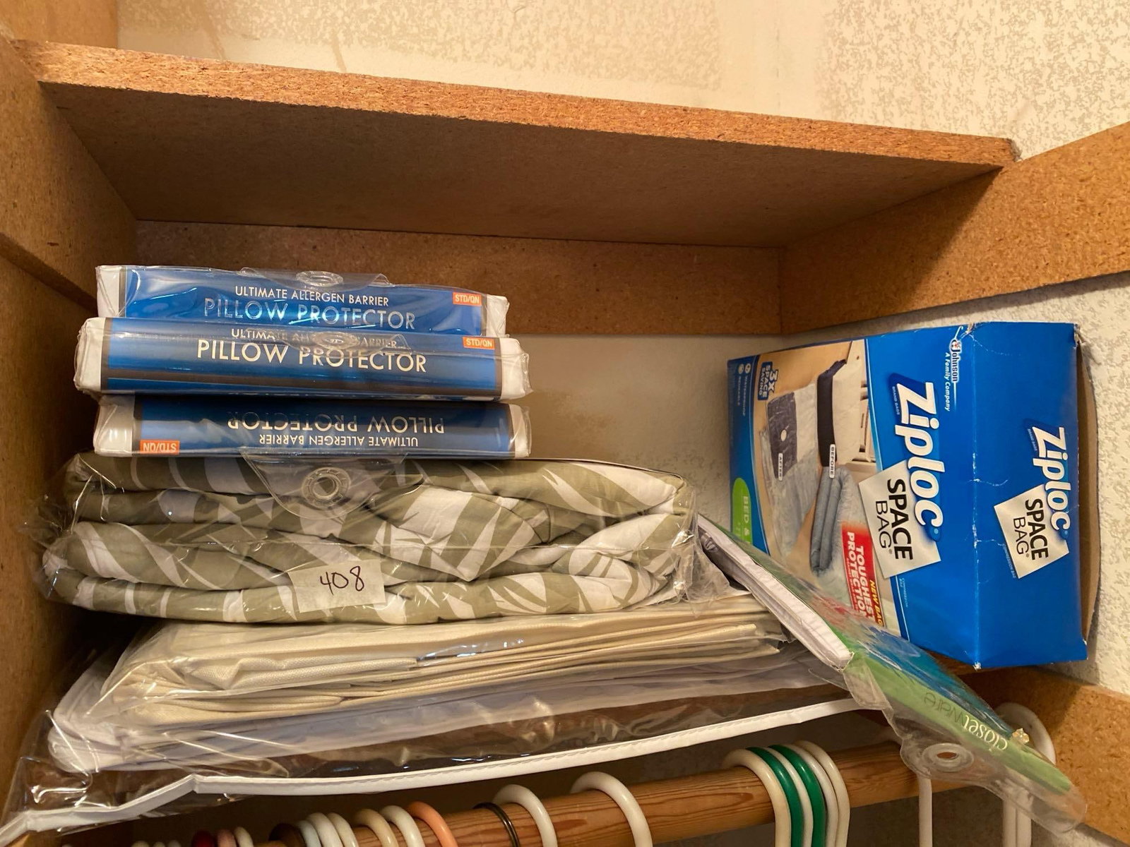 Lot Of Home Supplies, Including Pillow Protectors, Space Bags, And Ironing Board Cover, New In Bags: Lot of home supplies, including pillow protectors, space bags, and ironing board cover, new in bags.