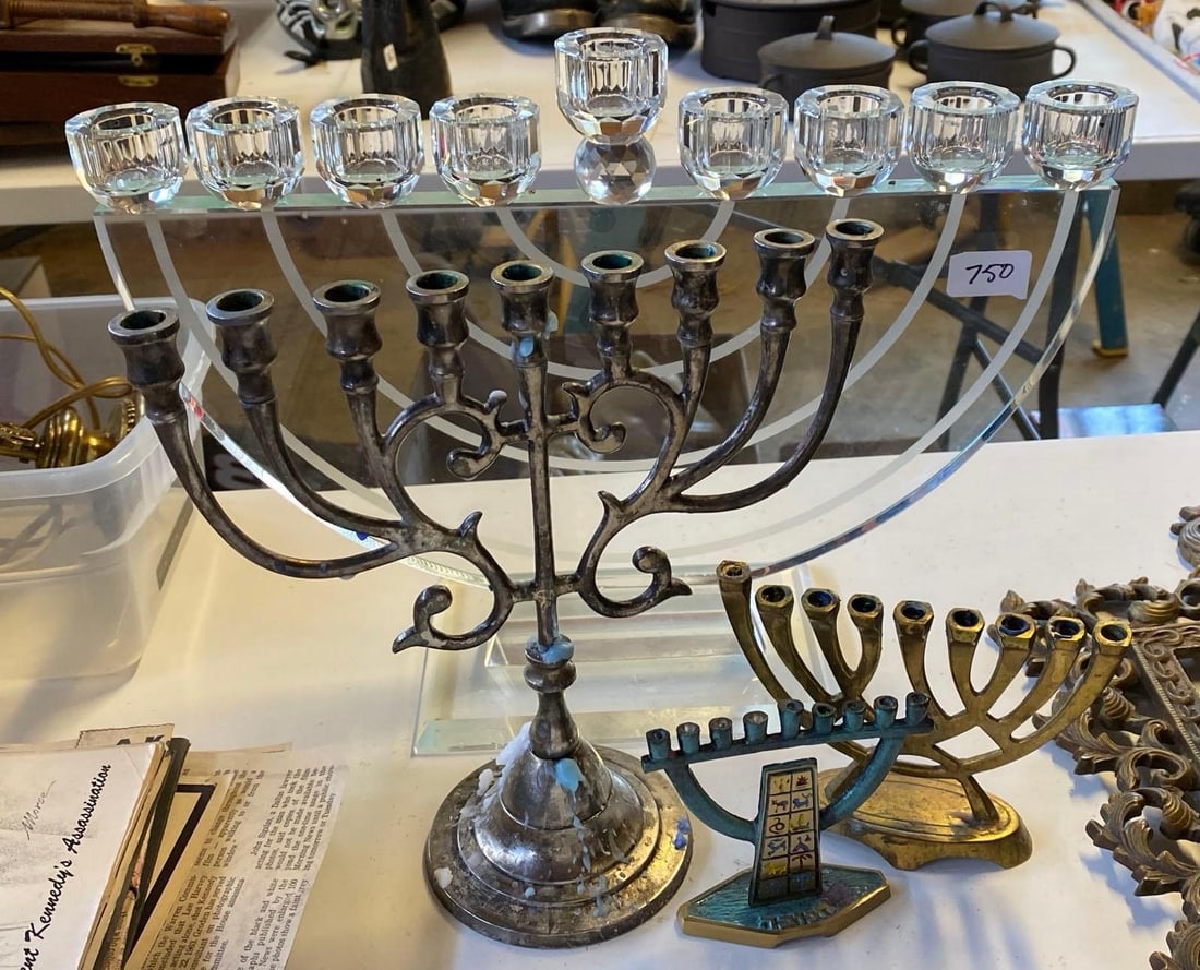 Etched Glass, Silver Plate, And Brass Menorahs: Etched glass, silver plate, and brass menorahs.