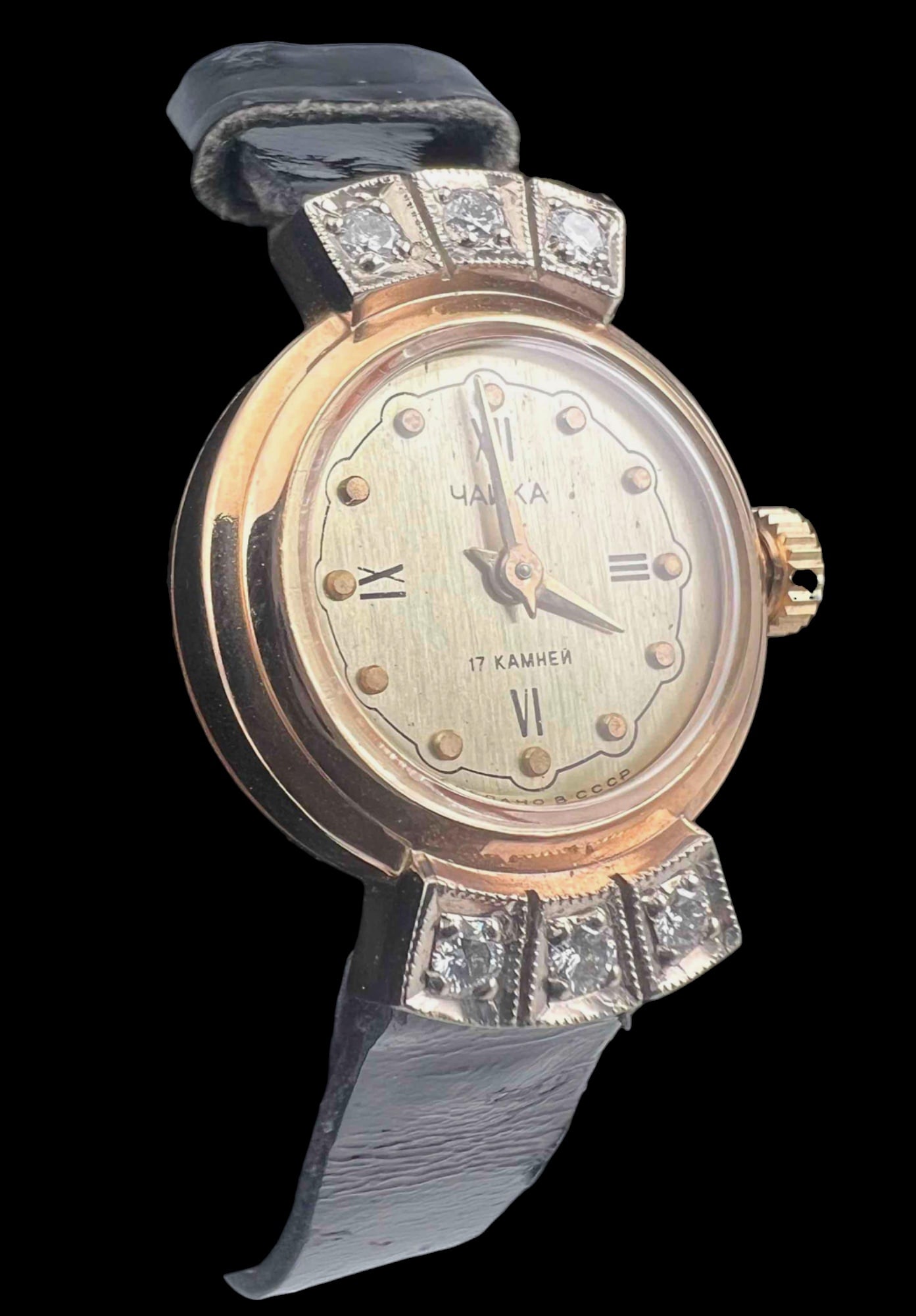 Mid Century Russian 14K Diamond Watch: Mid Century Russian 14K Diamond Ladies Watch. Marked 585, 17 Kamhen. &Watch approximately 1.0L x 0.75W in. Maximum inner measurement of band approximately 7.5in. ALL CREDIT CARDS WILL BE MANUALLY VERI