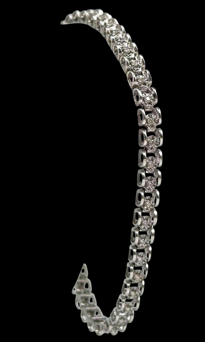 14K White Gold Diamond Tennis Bracelet: 14K White Gold Diamond Tennis Bracelet, 7.5g. Marked 14K. Approximately 7.125L x 0.125W in.