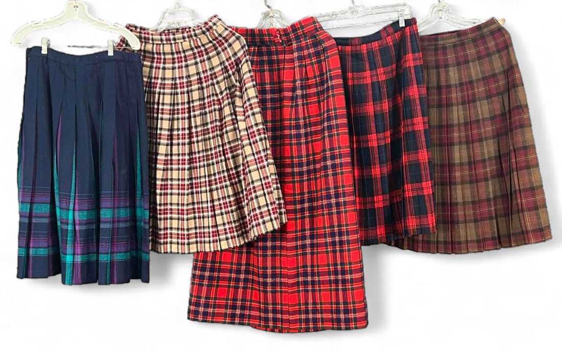 Five Vintage Wool Skirts Including Pendleton: Five Vintage Wool Skirts Including Pendleton. Red, tan, and white Pendleton skirt marked Size 12. Two skirts marked Size 16. One skirt marked size 14. Waist of longest Pendleton &skirt approximately 2
