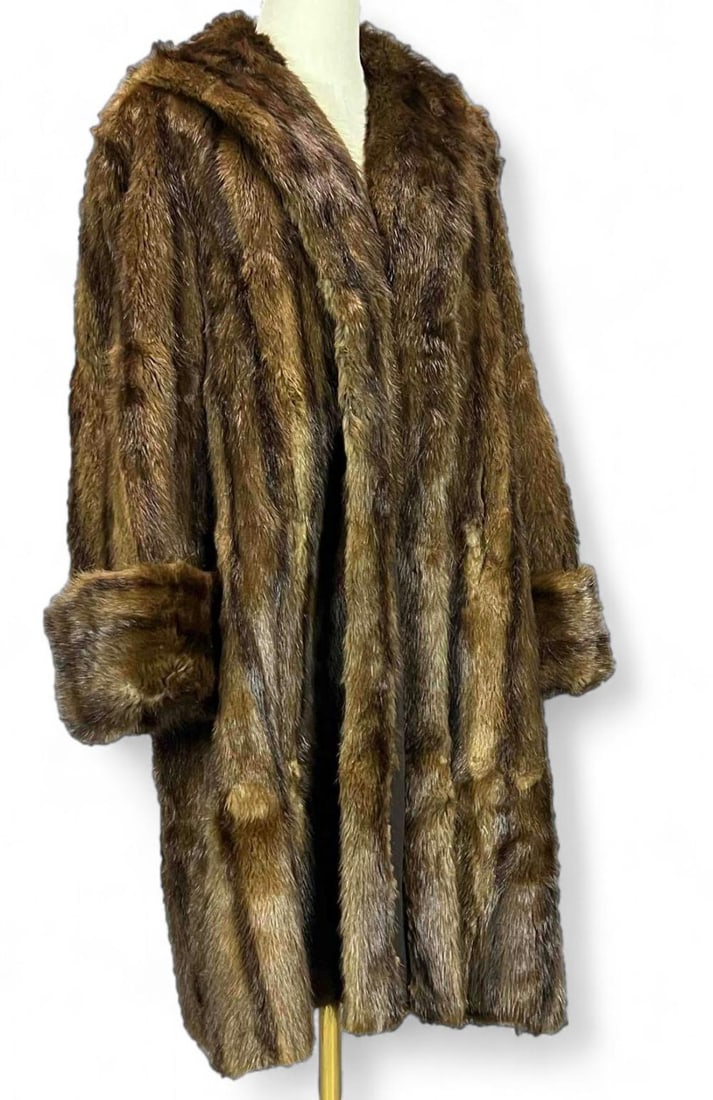 Vintage Mink Fur Coat, Julius Garfinckel & Co: Vintage Mink Fur Coat, Julius Garfinckel & Co. Total length &41.5in. Shoulders 23.0in. Chest 44in. Sleeve length 23.0in. All measurements are approximate and taken flat.