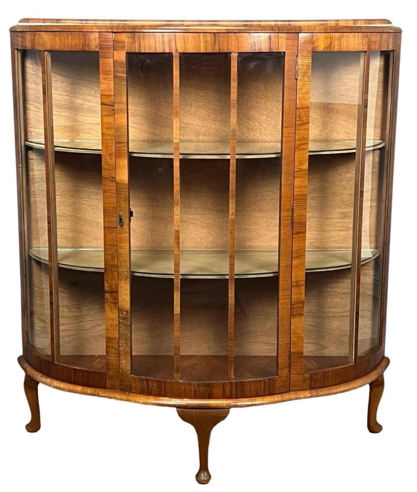Bow Front Walnut Vitrine: Bow Front Walnut Vitrine. Approximately 45.0H x 40.25W x 12.5D in.