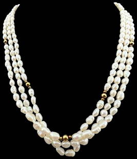 14K Three Strand Freshwater Pearl Necklace: 14K Three Strand Freshwater Pearl Necklace, Clasp Marked 14K. Approximately 19.0L x 0.625W in.