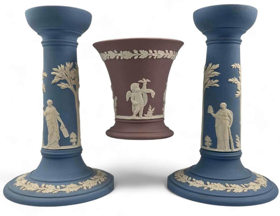 Wedgwood Jasperware Candlesticks & Vase: Wedgwood Jasperware Candlesticks & Vase. Candlesticks marked ""Wedgwood Made In England T 80." Vase marked "Wedgwood Made In England A 80." Candlesticks approximately 6.75H x 4.25W in. Vase approximat