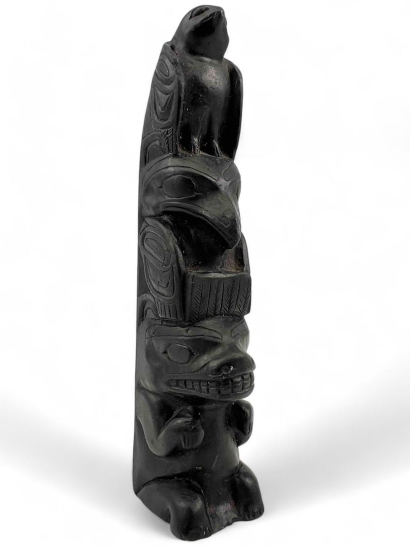 Haida Northwest Coast Carved Argilite Totem: Haida Northwest Coast Carved Argilite Totem. Approximately 5.125H x 1.25W x 1.25D in.