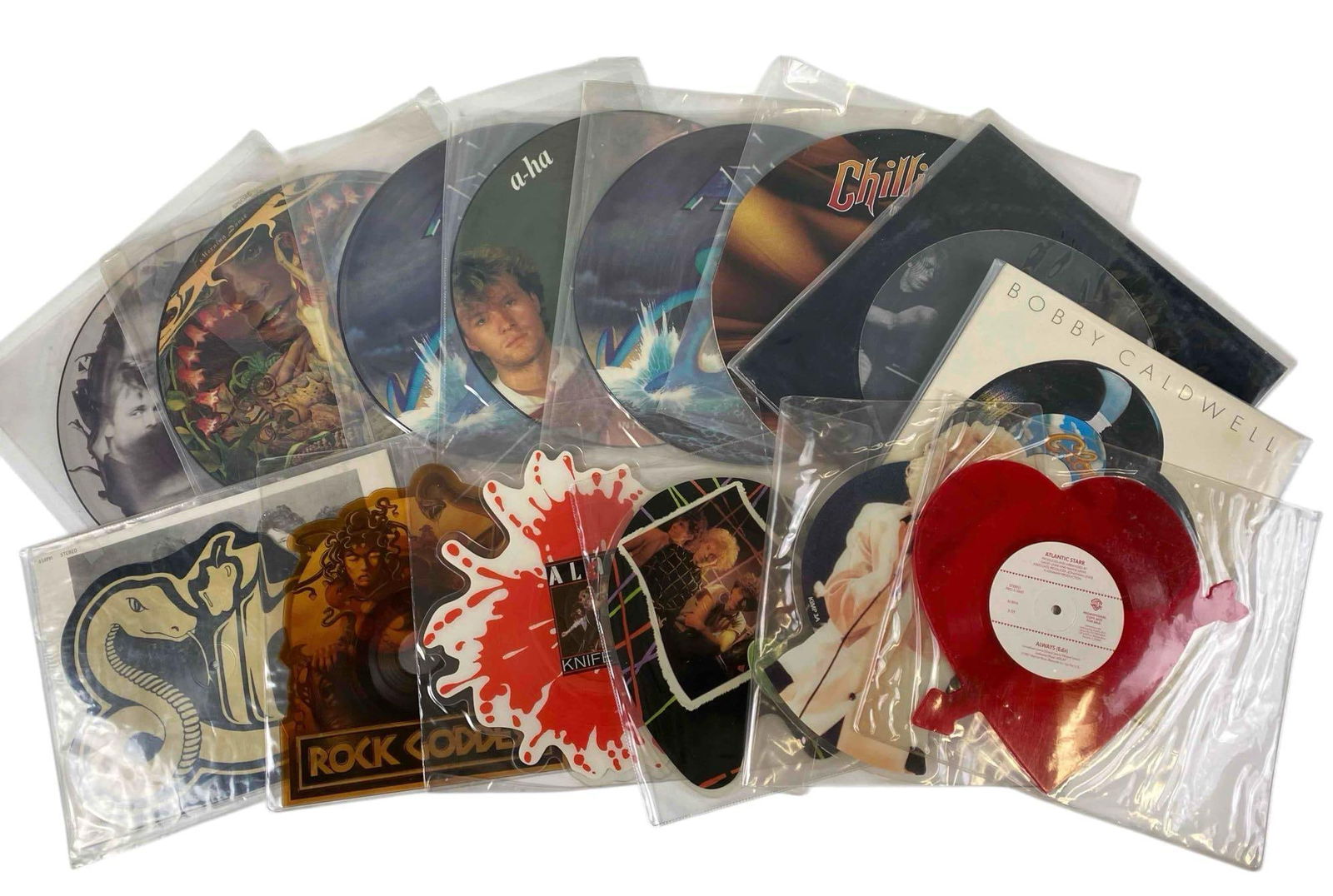 Lot Of Vinyl Records Including: Sin, Rock goddess, Azia, Alarm, Morning Dance, A-ha, Bobby Caldwell (1 of 8)