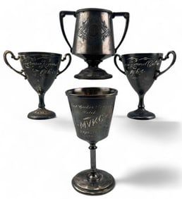 Four Early 20th Century Silverplate Kennel Club Trophies