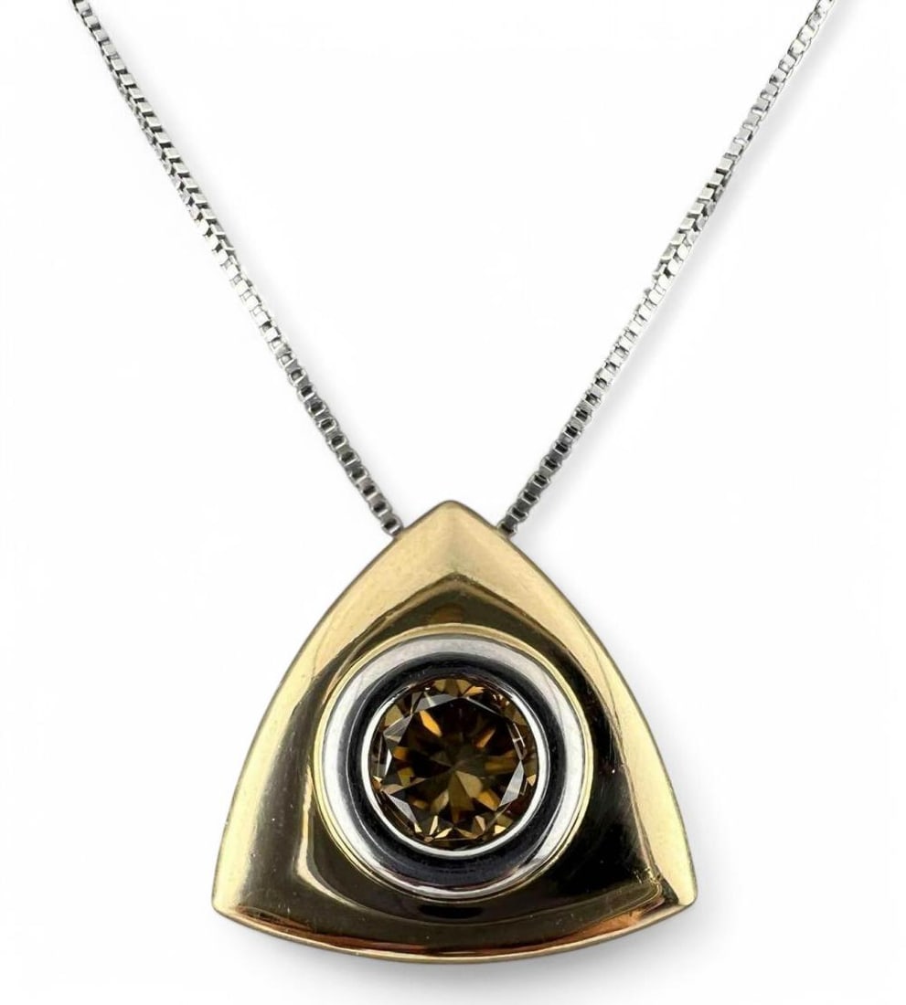 14K Yellow & White Gold Moissanite Slider Necklace: 14K Yellow & White Gold Moissanite Slider Necklace, 2.9g. Chain marked 14K, pendant unmarked, tests as 14K. Pendant approximately 0.53H x 0.53W in. Moissanite approximately 4.4mm. Chain length approxi