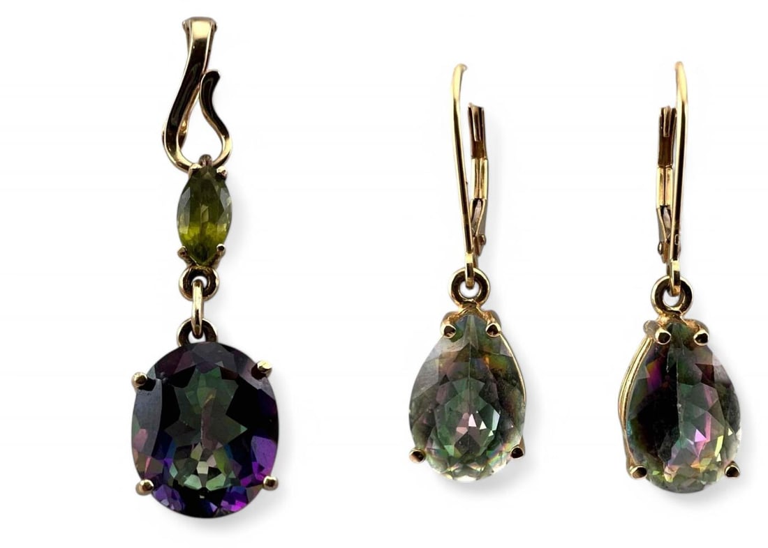 14K Mystic Topaz Peridot Pendant & Earrings: 14K Mystic Topaz Peridot Pendant & Earrings, 6.6g. Marked 14K. Pendant approximately 1.6875L x 0.375W in. Topaz in pendant approximately 12.0 x 9.8mm. Topaz in earrings approximately 12.0 x 7.8mm. ALL